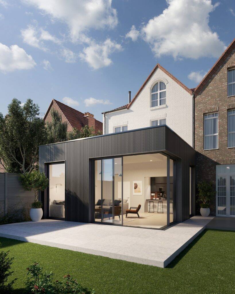 Garden room clad in Midnight composite slatted cladding