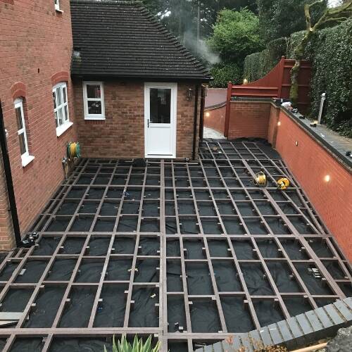 Timber-free aluminium decking subframe laid out before boarding