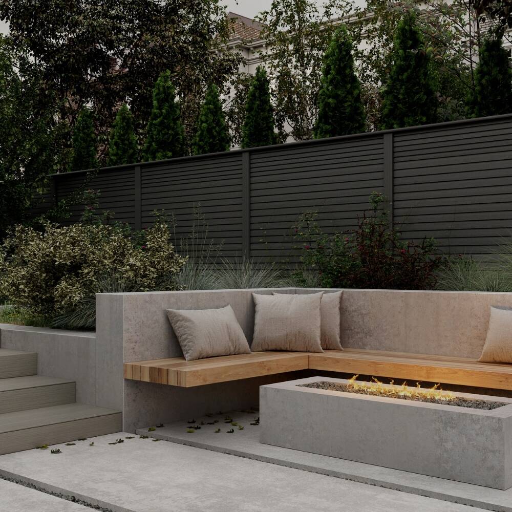 Charcoal composite fencing around a garden