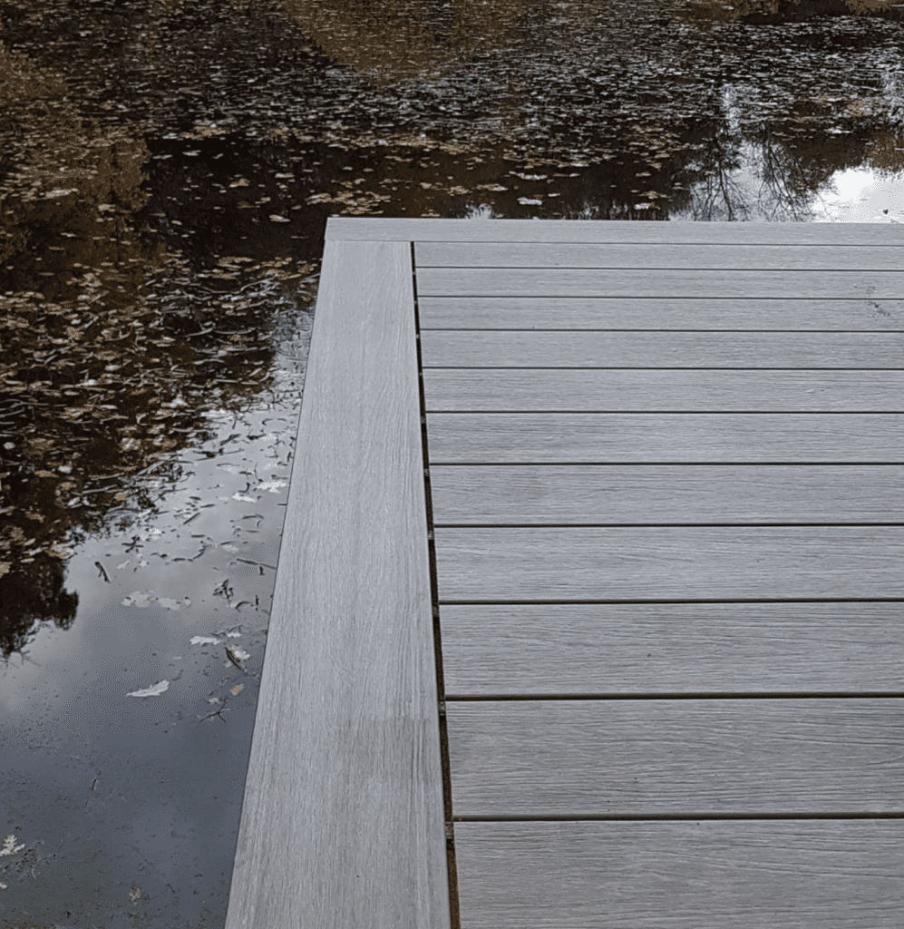 Argent composite decking by the water