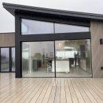 Silver Birch slatted cladding with composite decking